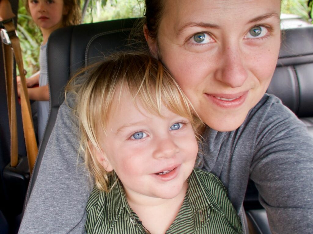 Jessica Haggard in the car wearing grey shirt.