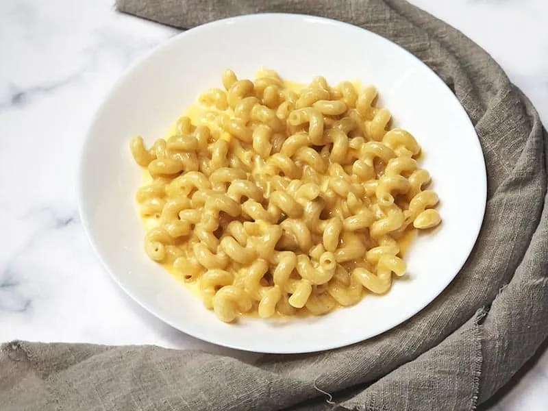 Copycat outback mac and cheese in white plate.