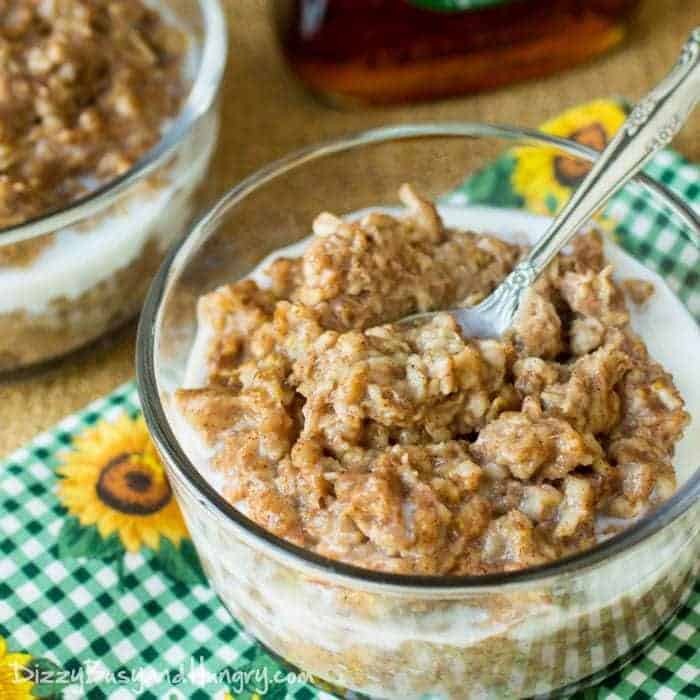 A bowl of maple cinnamon oatmeal with a spoon.