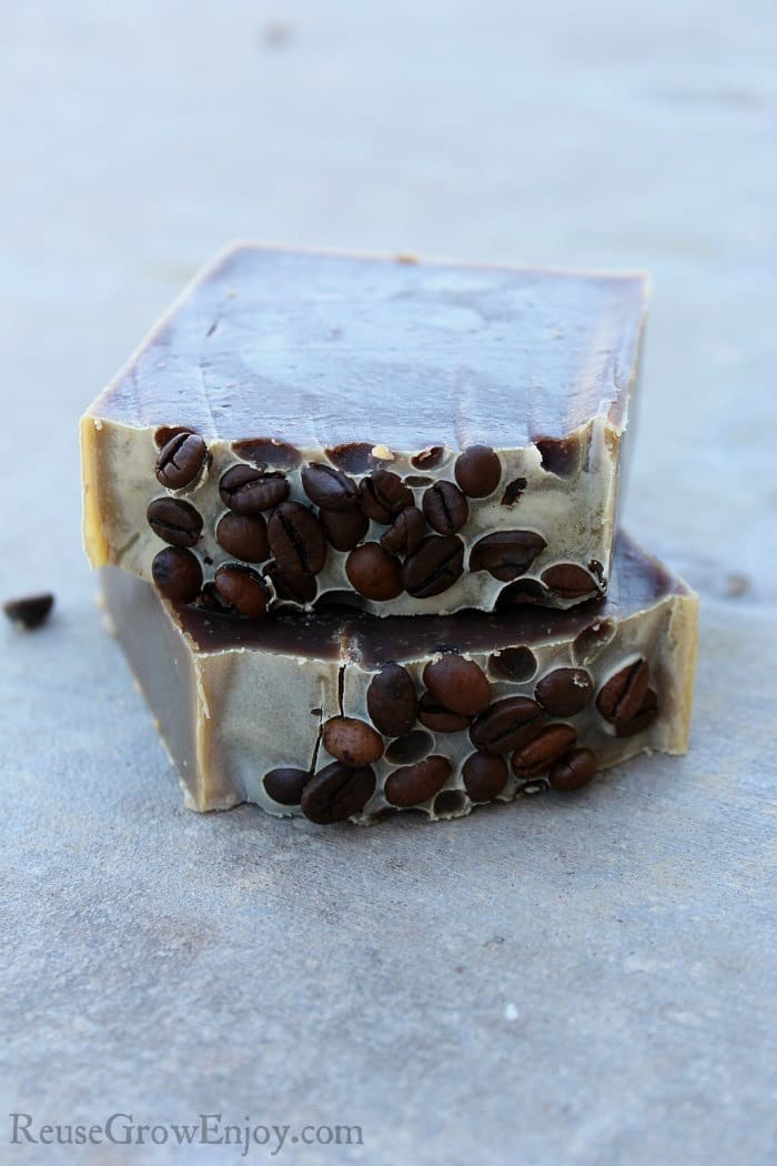 Two bars of coffee soap on top of each other.