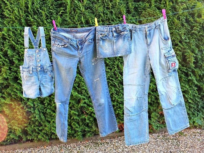 Jeans and denims hanging on the clothes line.