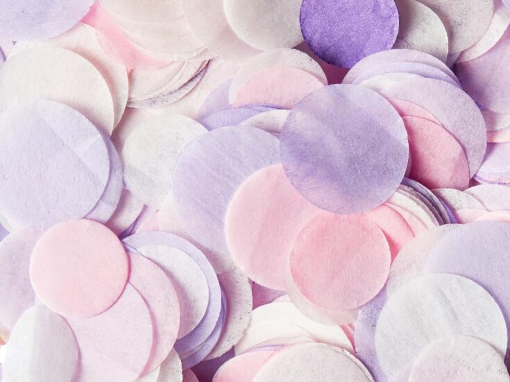 Bath soap confetti in pink, white, violet and purple colors.