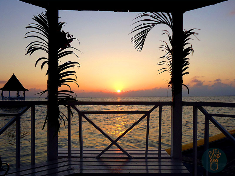 Sunset on a beach dock.