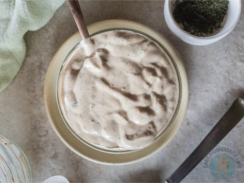 White sauce in a bowl with spoon.