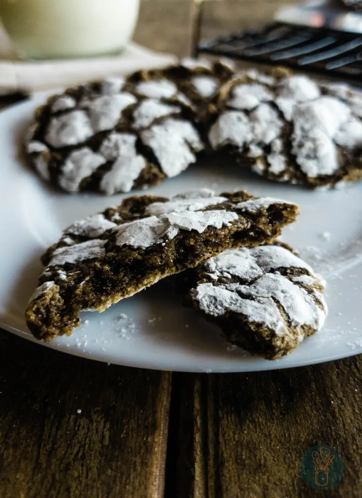 A plate of earthquake cookies with one broken in half.