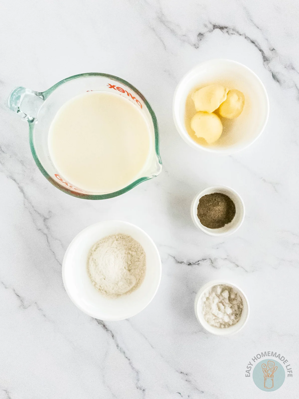 Pepper gravy ingredients in separate bowls and containers.