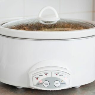 White slow cooker on 10 hour setting.