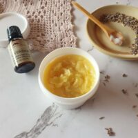 Lavender essential oil lotion mosquito repellent ingredients on separate bowls and containers.
