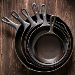 clean cast iron skillets in a stack