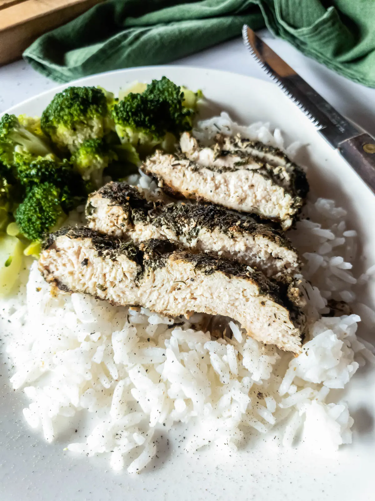 A picture of Texas Roadhouse chicken copycat with broccoli and rice.