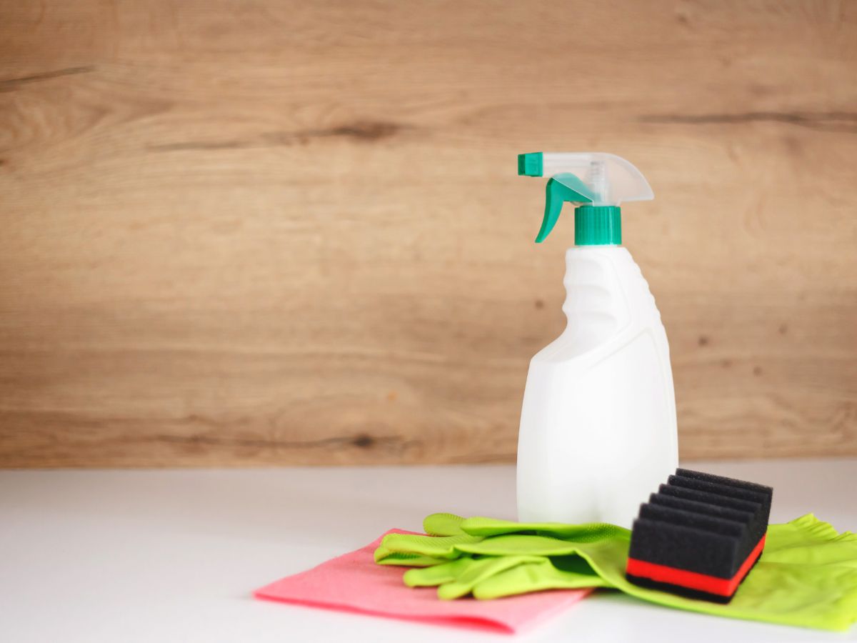A picture of cleaning supplies on countertop.