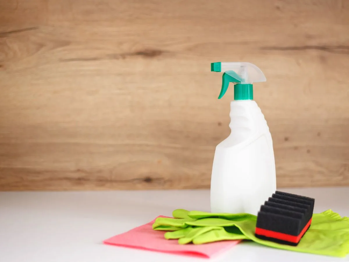 Cleaning supplies on countertop.