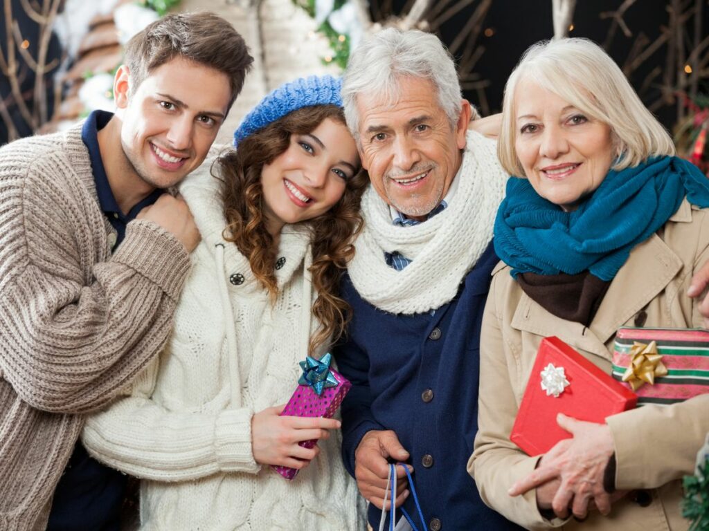 A happy family posing for a photo at christmas.