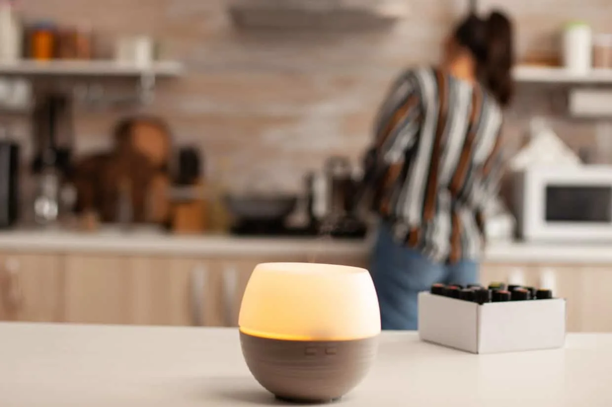 An essential oil diffuser with a light.