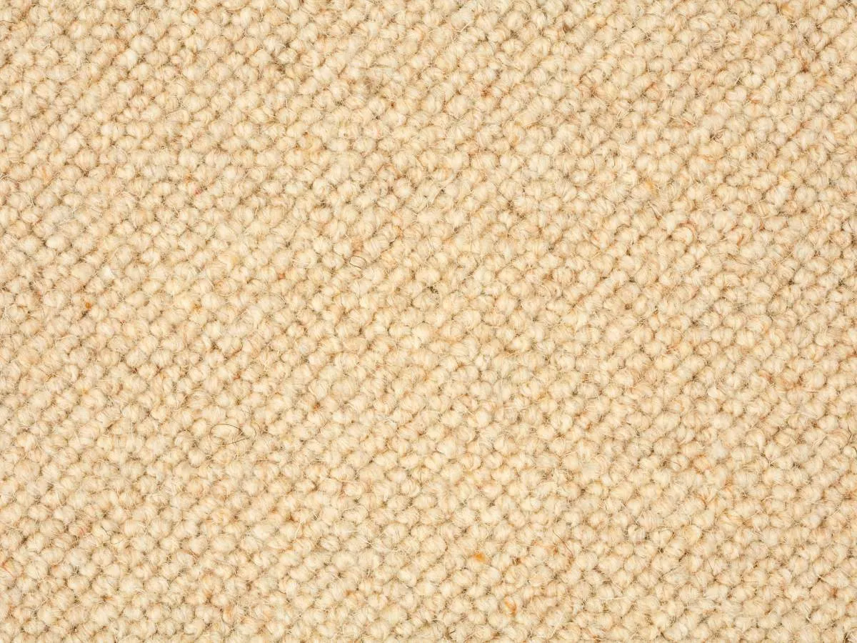 A close up of berber carpet.