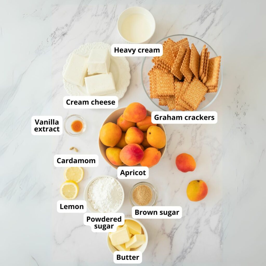Flat lay of labeled ingredients for apricot cheesecake.