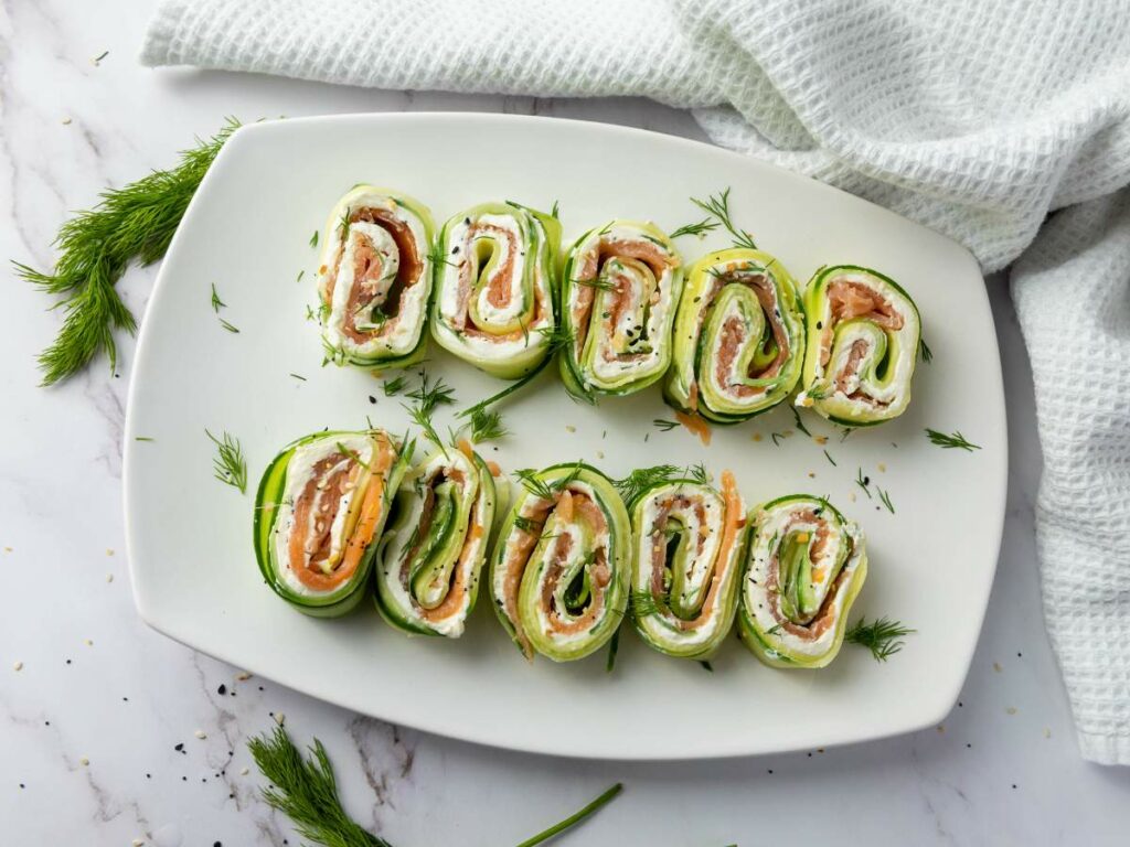 Ten cucumber pinwheels with cream cheese and smoked salmon.