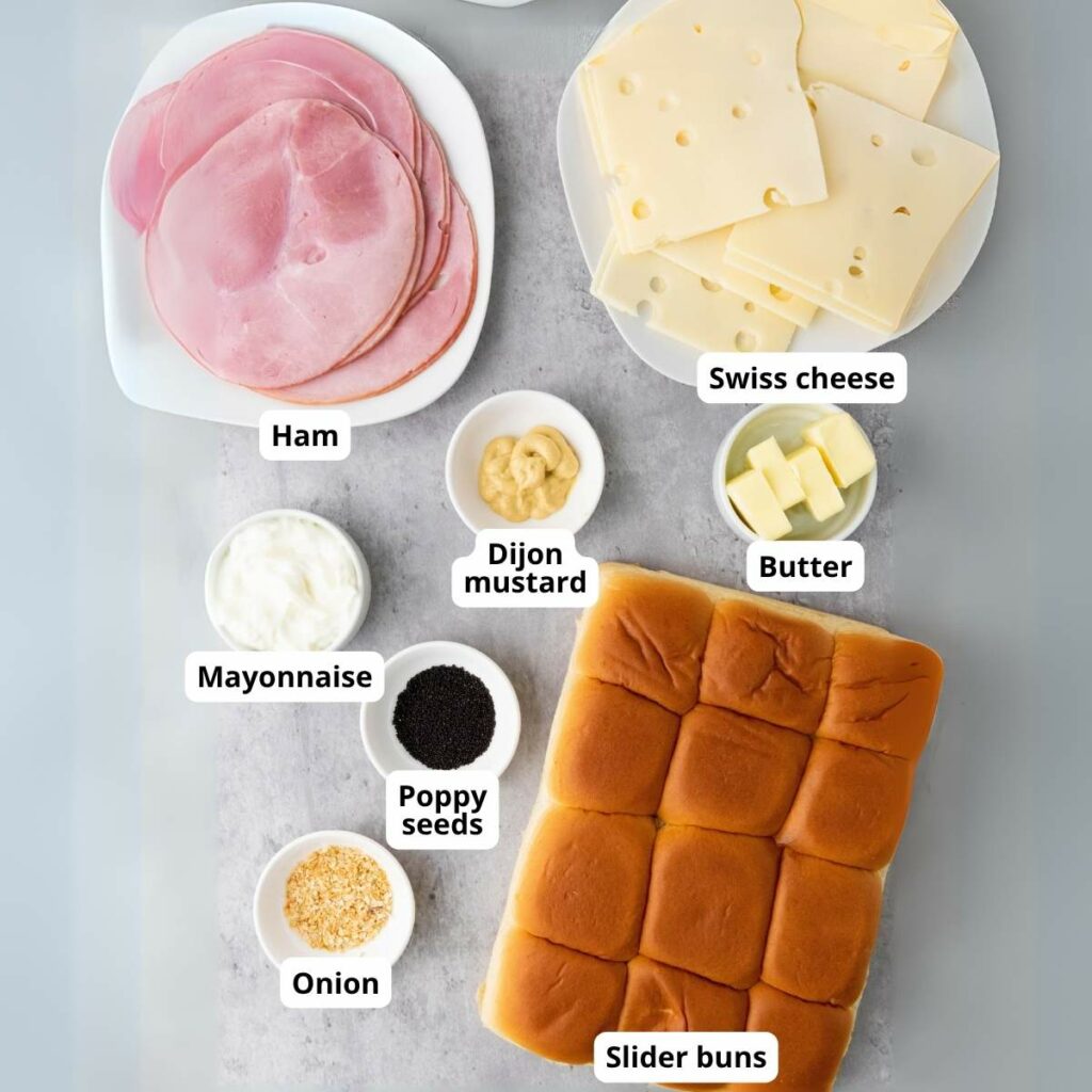 Ham, Swiss cheese, butter, mayonnaise, Dijon mustard, poppy seeds, onion, and slider buns.