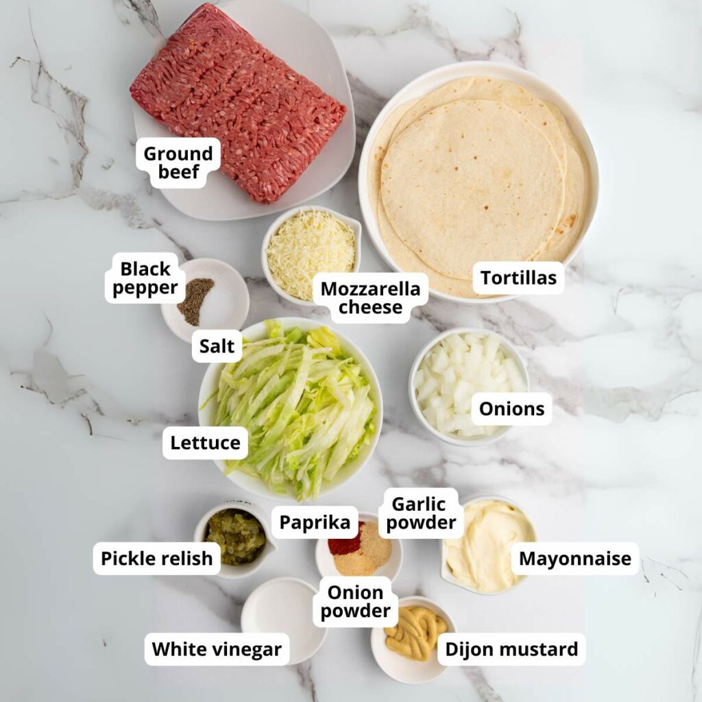 Ingredients for a recipe displayed on a marble surface.