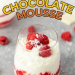 A glass of white chocolate mousse layered with raspberry sauce.