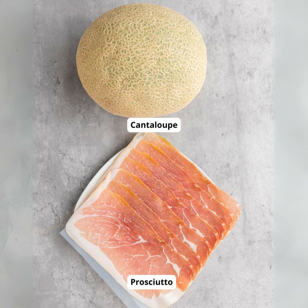 A whole cantaloupe and a package of sliced prosciutto labeled on a gray surface.