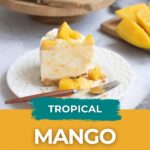 A slice of mango cheesecake topped with mango pieces is on a white plate with a fork; more cheesecake and mango are in the background. Text reads "Tropical Mango Cheesecake.